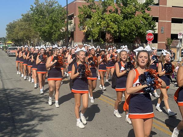 Photo of cheer marching at Old Settlers Day Parade